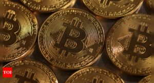 Bitcoin surges to record above $69,000 on sustained ETF demand - Times of India