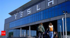 Elon Musk visits a Tesla plant near Berlin as production resumes after a suspected arson attack - Times of India