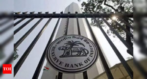 RBI bars IIFL Finance from sanctioning, disbursing gold loans - Times of India