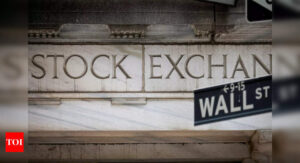 Wall Street hits record closing highs on rate-cut optimism - Times of India