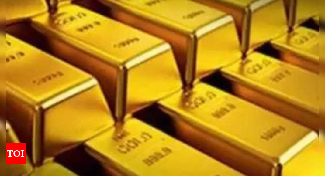 Gold surges as Middle East tensions spur safe-haven rush - Times of India