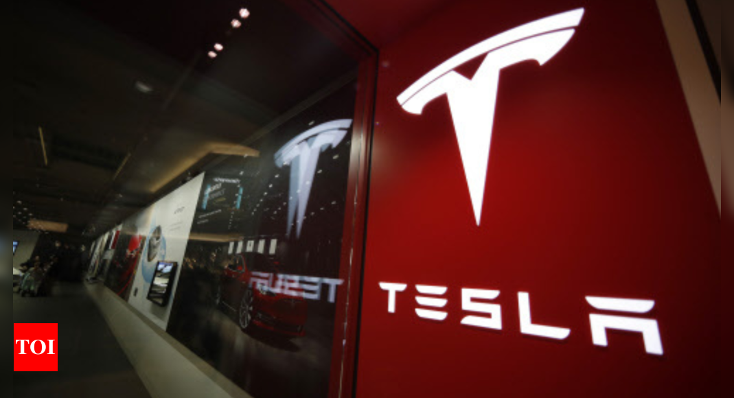 Tesla to lay off more than 10% of its staff - Times of India