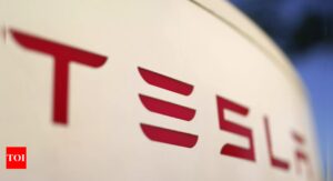 Tesla's quarter one sales fall nearly 9% as competition heats up and demand for electric vehicles slows - Times of India